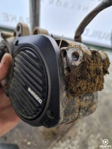 caked mud around the electric mountain bike motor